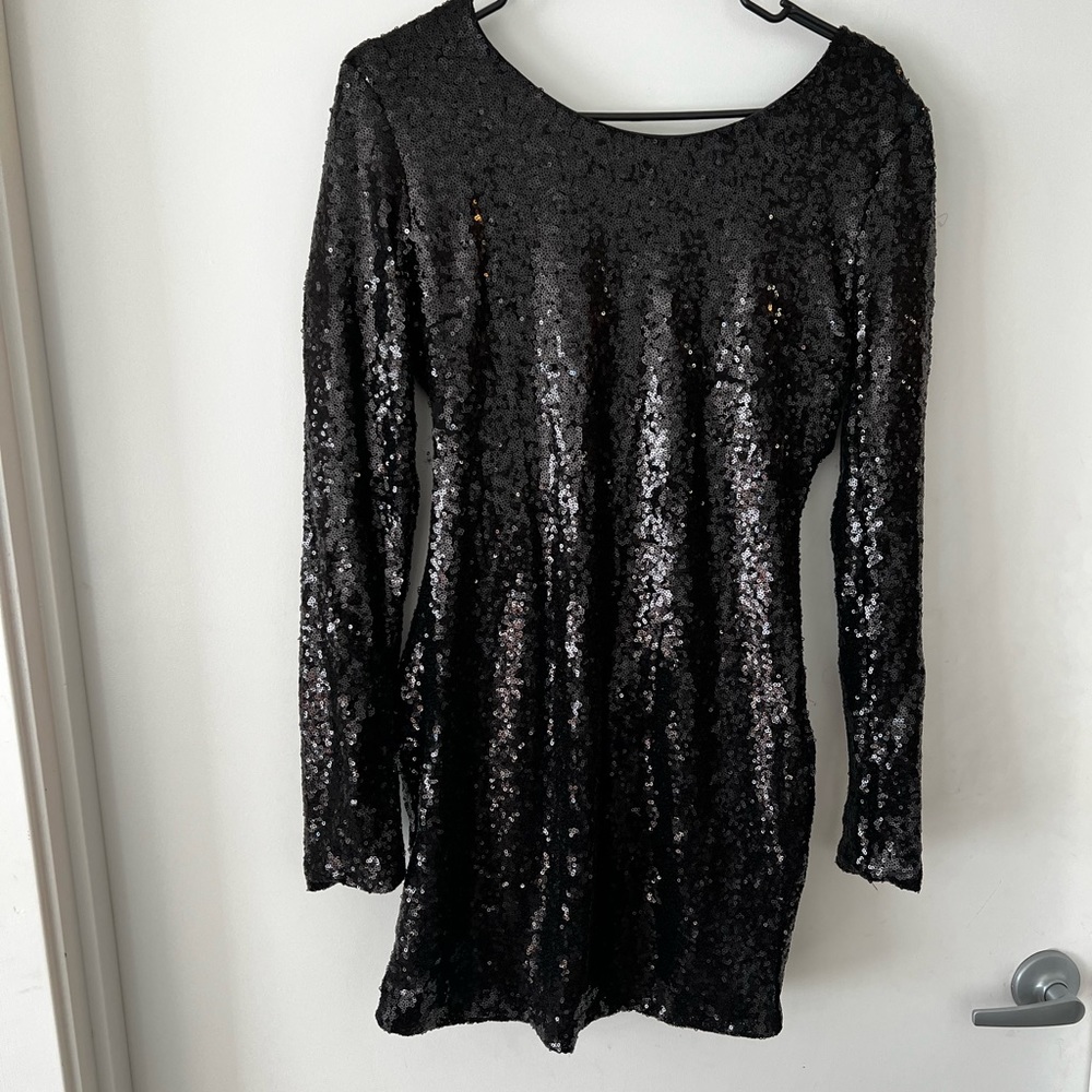 Boutique, short black women’s sequin dress. Open back - super sexy!